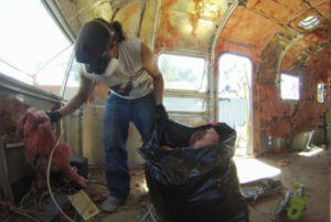 Dressed for the job @ FreeStyleTrailerCo - Cleaning out old rodent infested insulation on another Airstream project.
